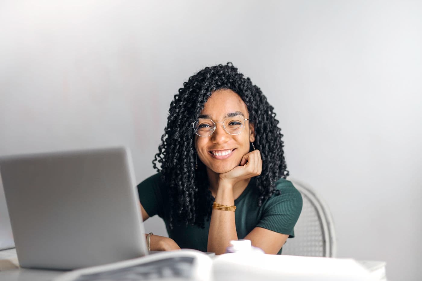 Nigerian fashion entrepreneur in a tailoring workspace